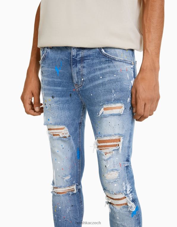muži Bershka roztrhané barvy postříkat úzké džíny P88443172 oblečení modrý
