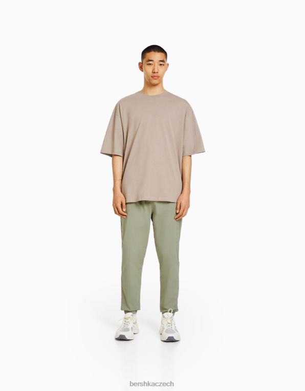 muži Bershka bavlněné tepláky P88443260 oblečení khaki