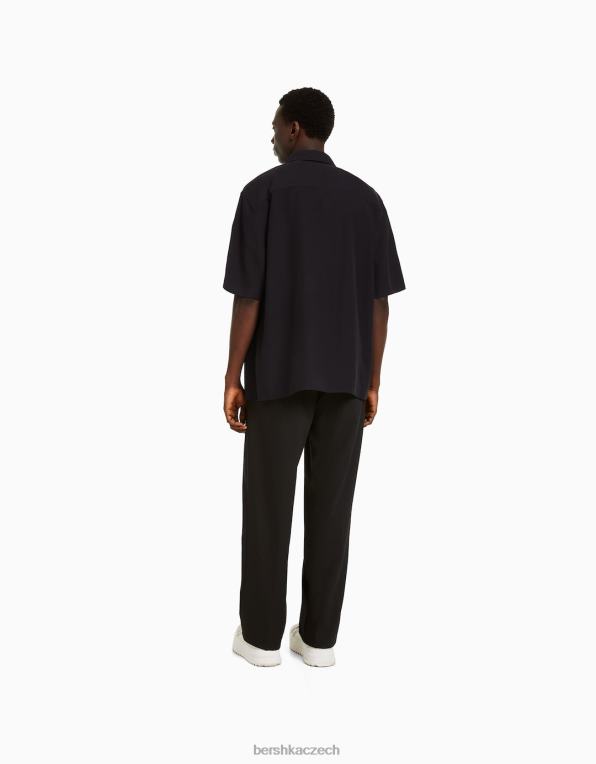 muži Bershka šité kalhoty širokého střihu v jogger stylu P88443029 oblečení Černá