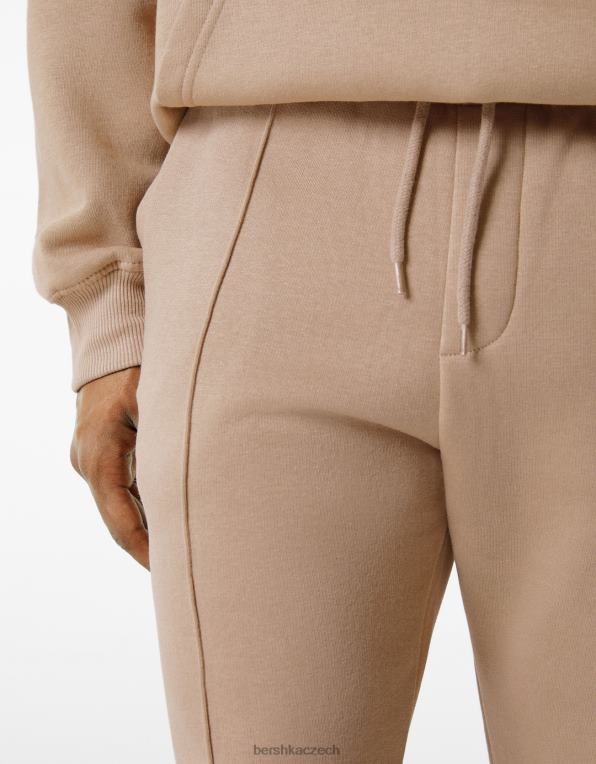 muži Bershka plyšové tepláky P88443268 oblečení velbloud