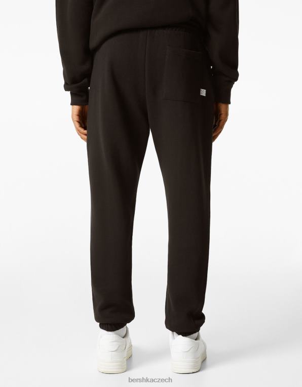 muži Bershka plyšové tepláky P88443269 oblečení Černá