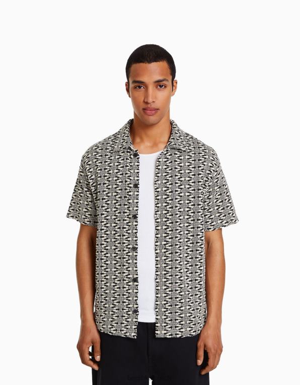 muži Bershka úpletová košile s krátkým rukávem s potiskem P88442872 oblečení krém