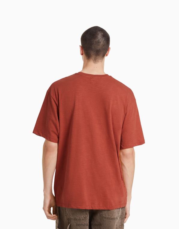 muži Bershka potištěné tričko s krátkým rukávem a kapsou P88442834 oblečení tmavě oranžová