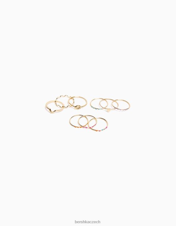 ženy Bershka sada 9 jemných štrasových prstenů se smaltovaným křížem P88442482 Příslušenství zlato